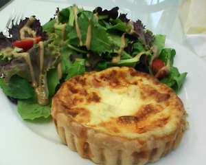 Pillowy perfect Quiche Lorraine and greens with a Dijon vinaegrette at Le Patissier. 